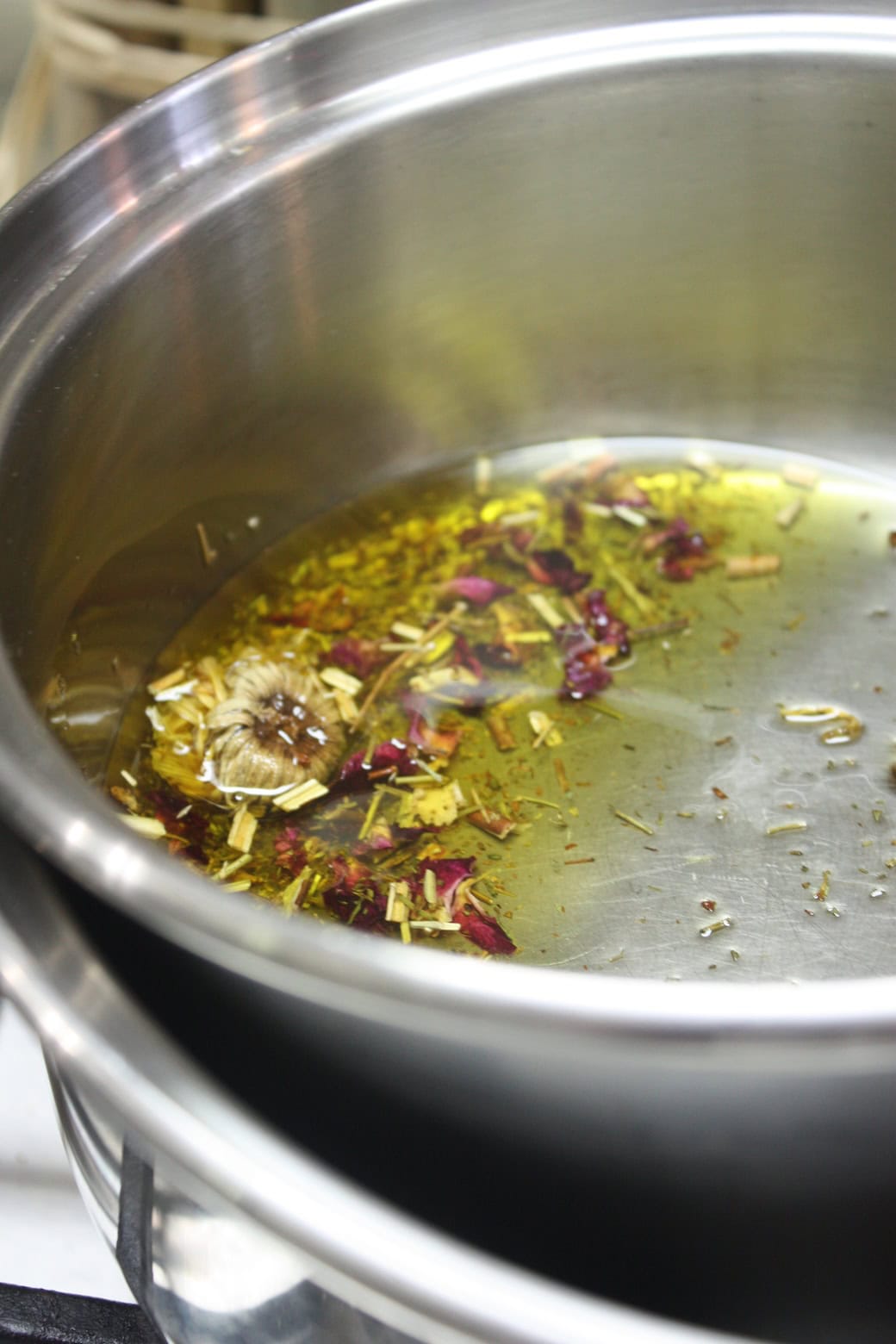 Herb-Infused Oils: The Most Underrated Herbal Preparation | Growing Up Herbal | Herb-infused oils might be an underrated herbal preparation for the family herbalist, but they are an excellent way to use herbs. Here's why.